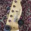 Thumbnail: Front view of the Tokai Breezysound headstock displaying the Tokai logo and tuning pegs.
