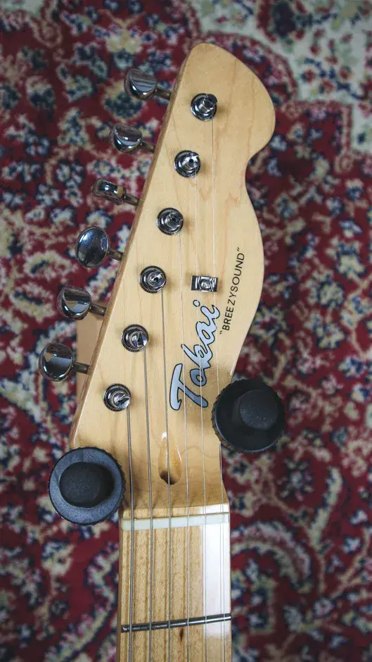 Thumbnail: Front view of the Tokai Breezysound headstock displaying the Tokai logo and tuning pegs.
