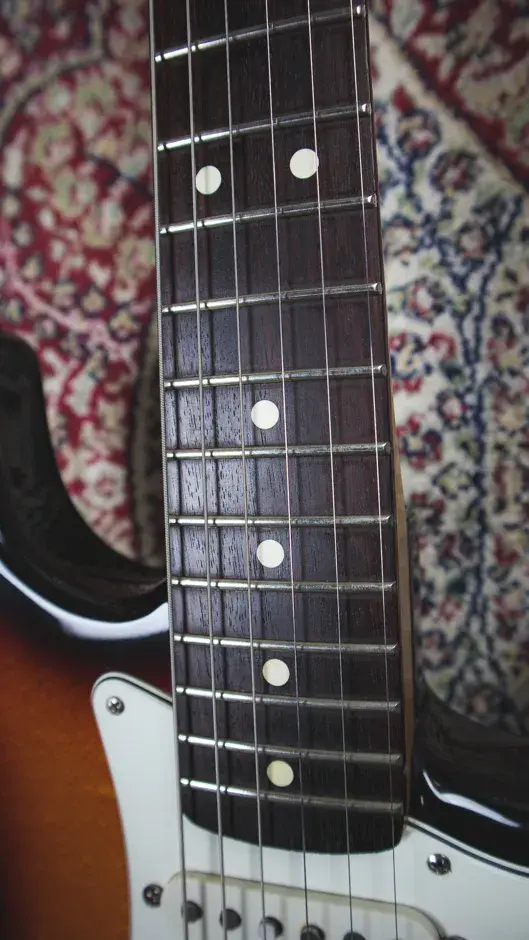 Thumbnail: Close-up of the frets and rosewood fretboard on the 1996 Fender Tex-Mex Stratocaster, showcasing clean fretwork and smooth fi