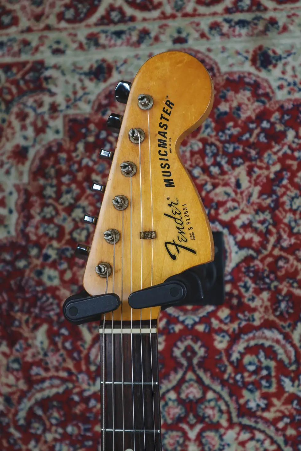 Thumbnail: 1978 Fender Musicmaster Black headstock showing original Fender logo and vintage tuners
