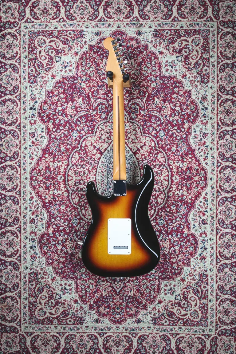 Fender Roadhouse Stratocaster full back view showing neck-through joint and sunburst body.