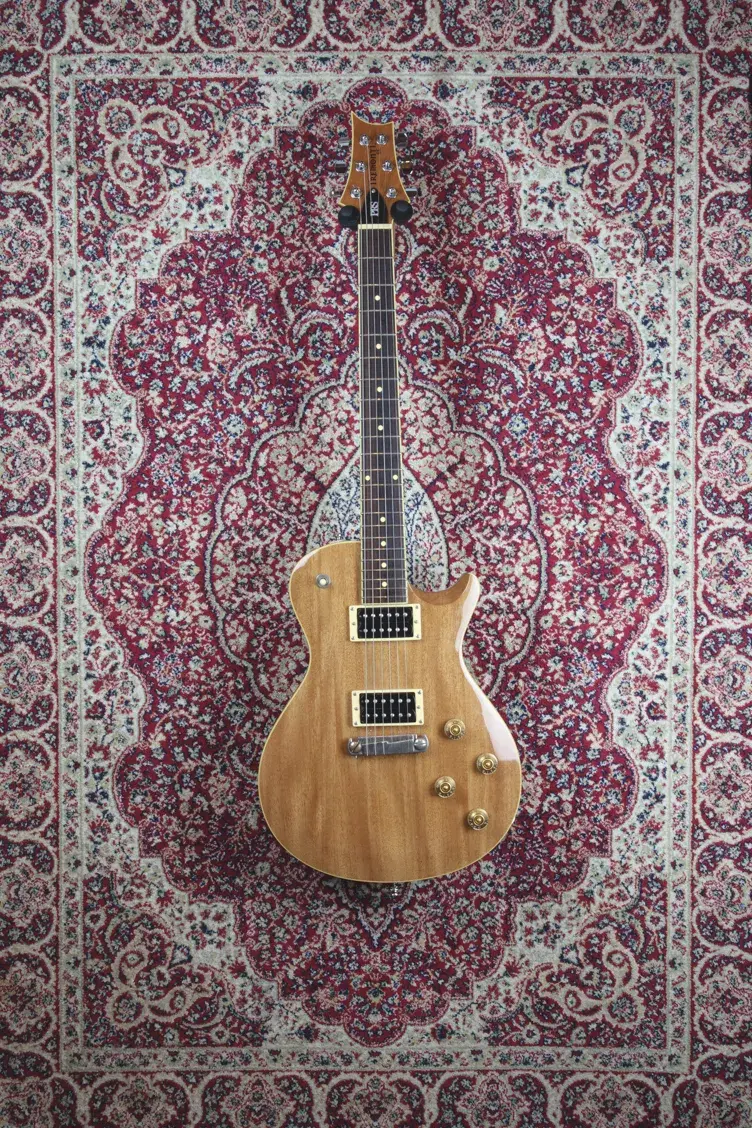 Full front shot of PRS SE Tremonti in natural finish