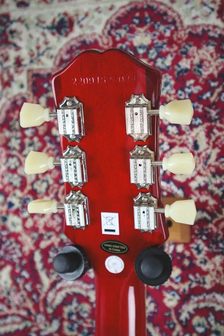 Thumbnail: Tuners and serial number on back of Les Paul headstock