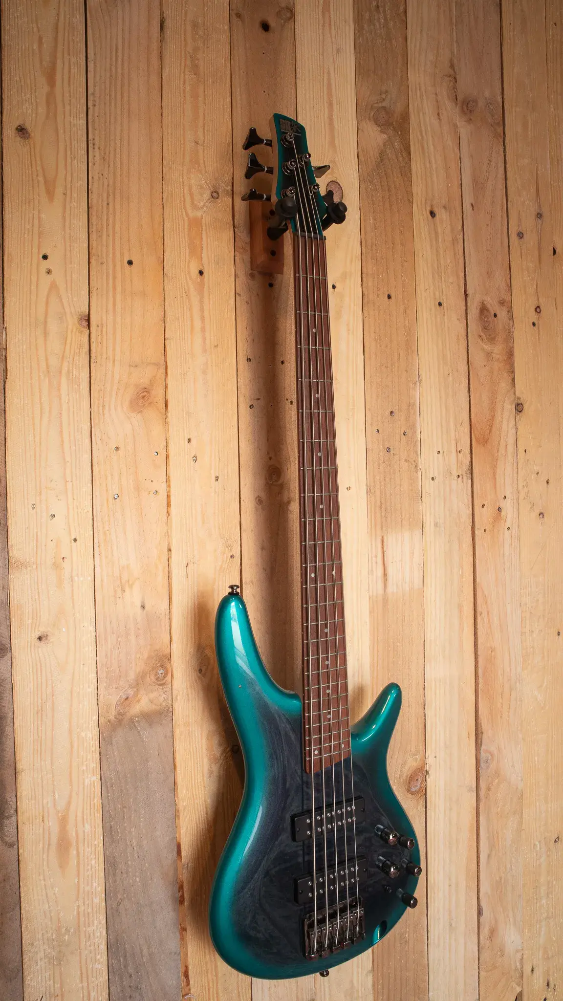 Ibanez SR305E full front view showcasing the Cerulean Aura Burst finish
