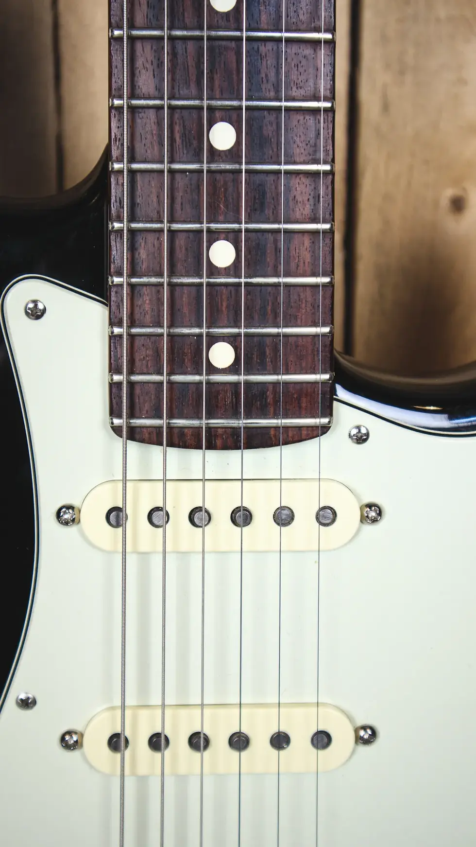 Thumbnail: Front Upper Body Close-up view of Fender American Professional Stratocaster in black