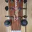 Thumbnail: TRU8EAS guitar headstock featuring the logo and tuners.