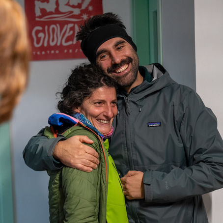 Man embracing women in friendly hug