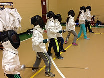 Fencers pu on gear for first time