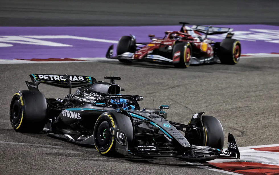 George Russell under attack from Charles Leclerc at the Bahrain Grand Prix, retrieved from XPB Images.