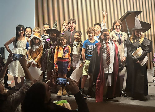 Students in costume during a themed recital at Preston Harmony School of Music