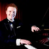 Joel Arnold, piano & violin instructor at Preston Harmony School of Music