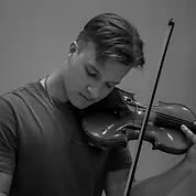 Dmitrii Tabala, violin and viola instructor at Preston Harmony School of Music