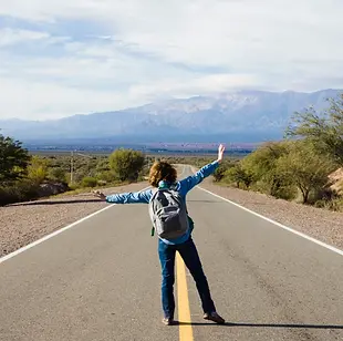 young-man-standing-highway.webp