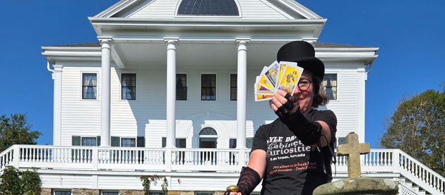 Author and Creator, Ellen E. Sutherland in front of the Doyle Dalton house.