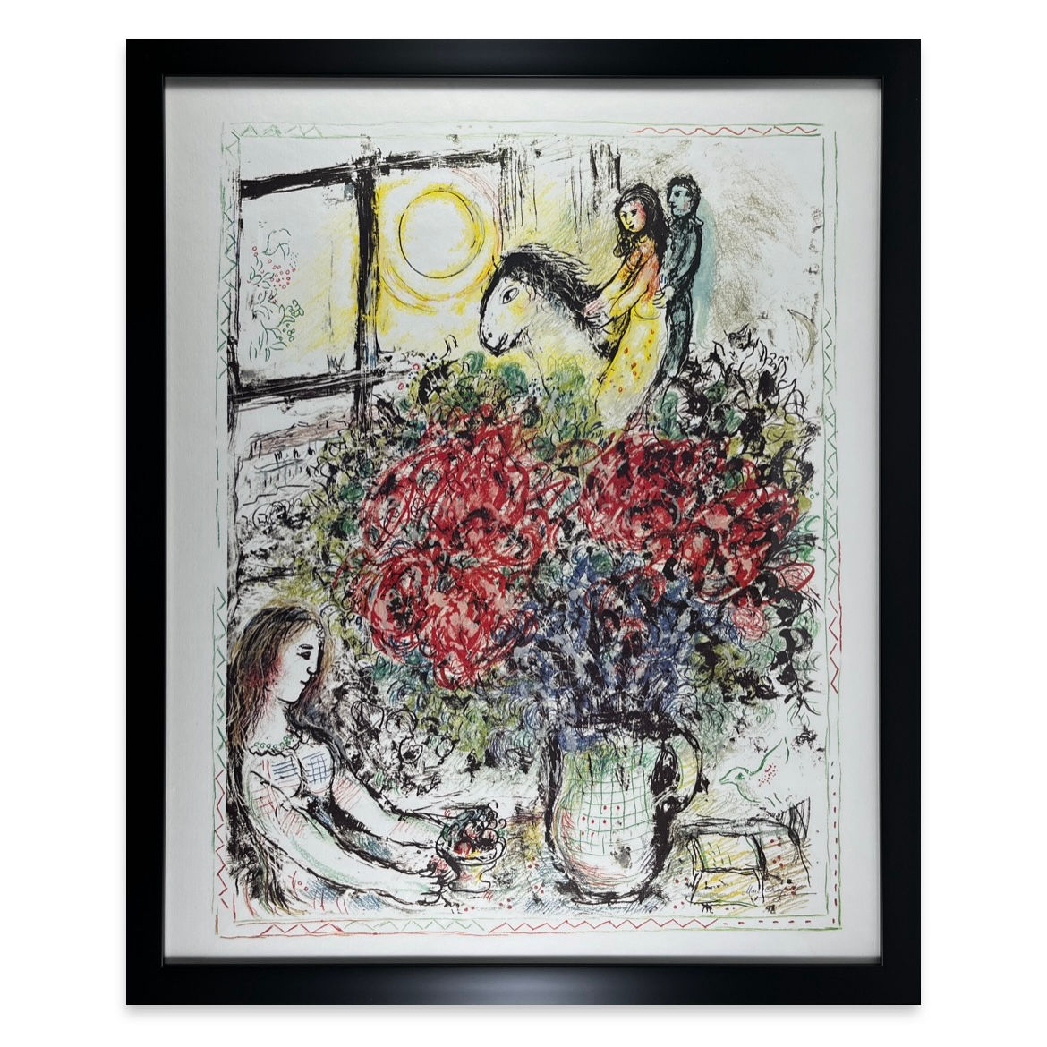 Marc Chagall's La Chevauchée, lithograph in multicolour, showing a couple on horseback, black frame