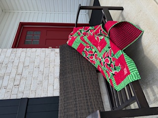 Handmade summer quilt using BQ7 pattern and vibrant watermelon print fabric
