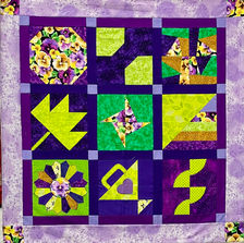 Easy beginner quilt pattern in assorted colorful fabrics