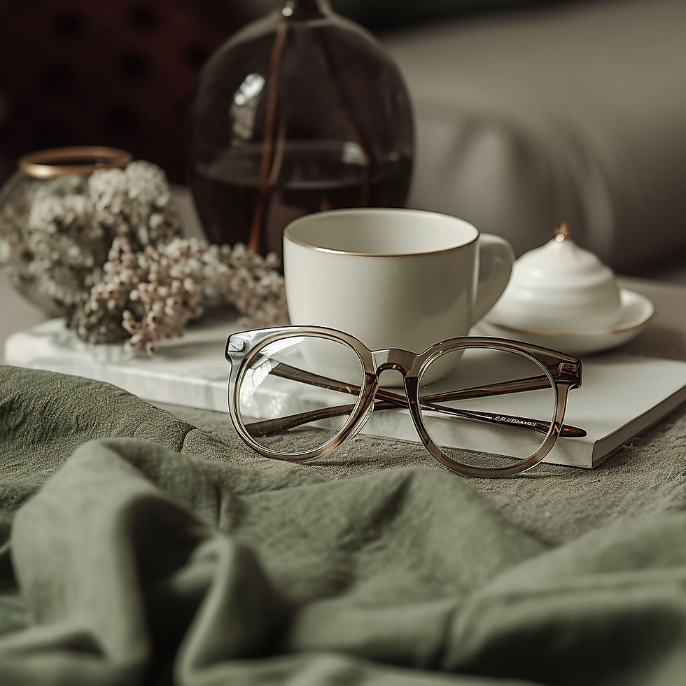 Marketing Strategy Psychology. Reading glasses and a coffee mug sitting on a table.