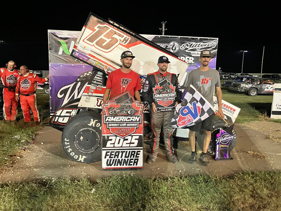 A picture of Sam Hafertepe Jr. celebrating in victory lane at the WaKeeney Speedway!