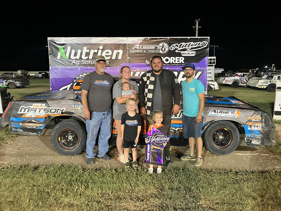 A picture of Morgan Olmstead in victory lane at WaKeeney Speedway!