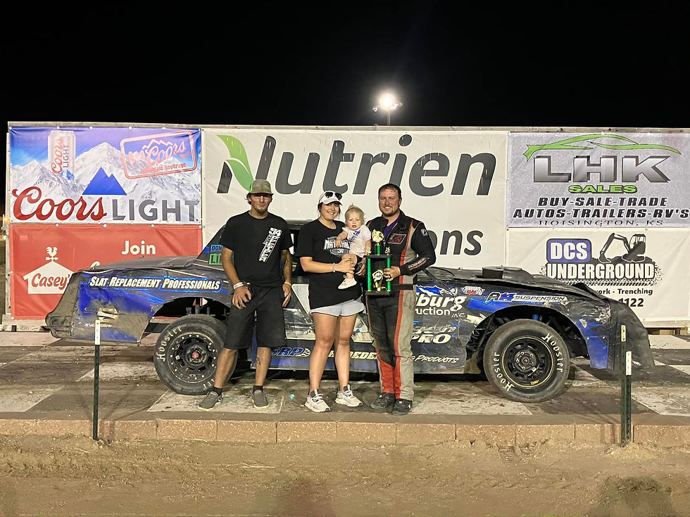 A picture of Kyle Pfeifer celebrating in victory lane!