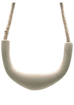 a white necklace with a rope around it
