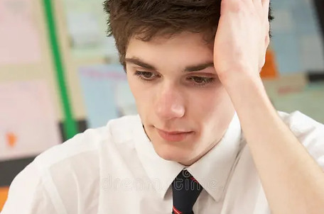 stressed-male-teenage-student-studying-18034813_edited.jpg