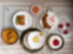Table spread of contemporary Indian dishes at Musaafer NYC fine dining restaurant