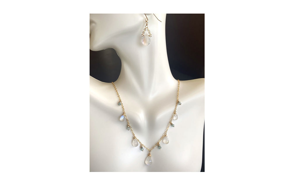 Rainbow Moonstone in gold set