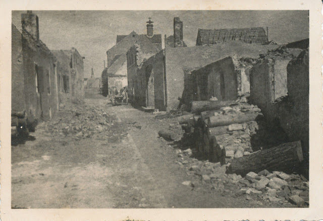 GI photo.The back of this photo indicates that this is “the remains of SS Headquarter in Germany,” but the headquarters were in Berlin and to me this looks to be more of a rural setting (e.g.stacked logs). Stuart Archive.