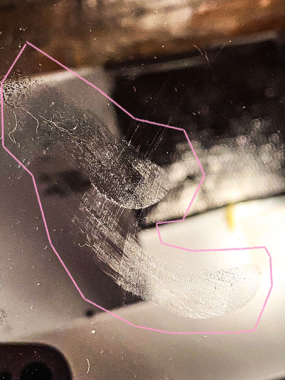Another way Hans leaves fingerprints behind is in a swooping, curved manner such as these prints left on my glass-top cooktop shortly after I had polished the surface the night before. The elongated smearing and directional movement differ noticeably from his more static finger pad impressions. I documented these prints on October 12, 2024, at 07:48 in my current home.