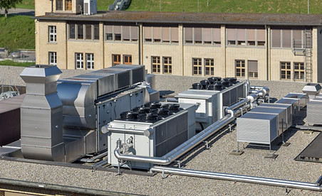 ventilation system on the roof - monobloc next to an air cooled chiller.jpg