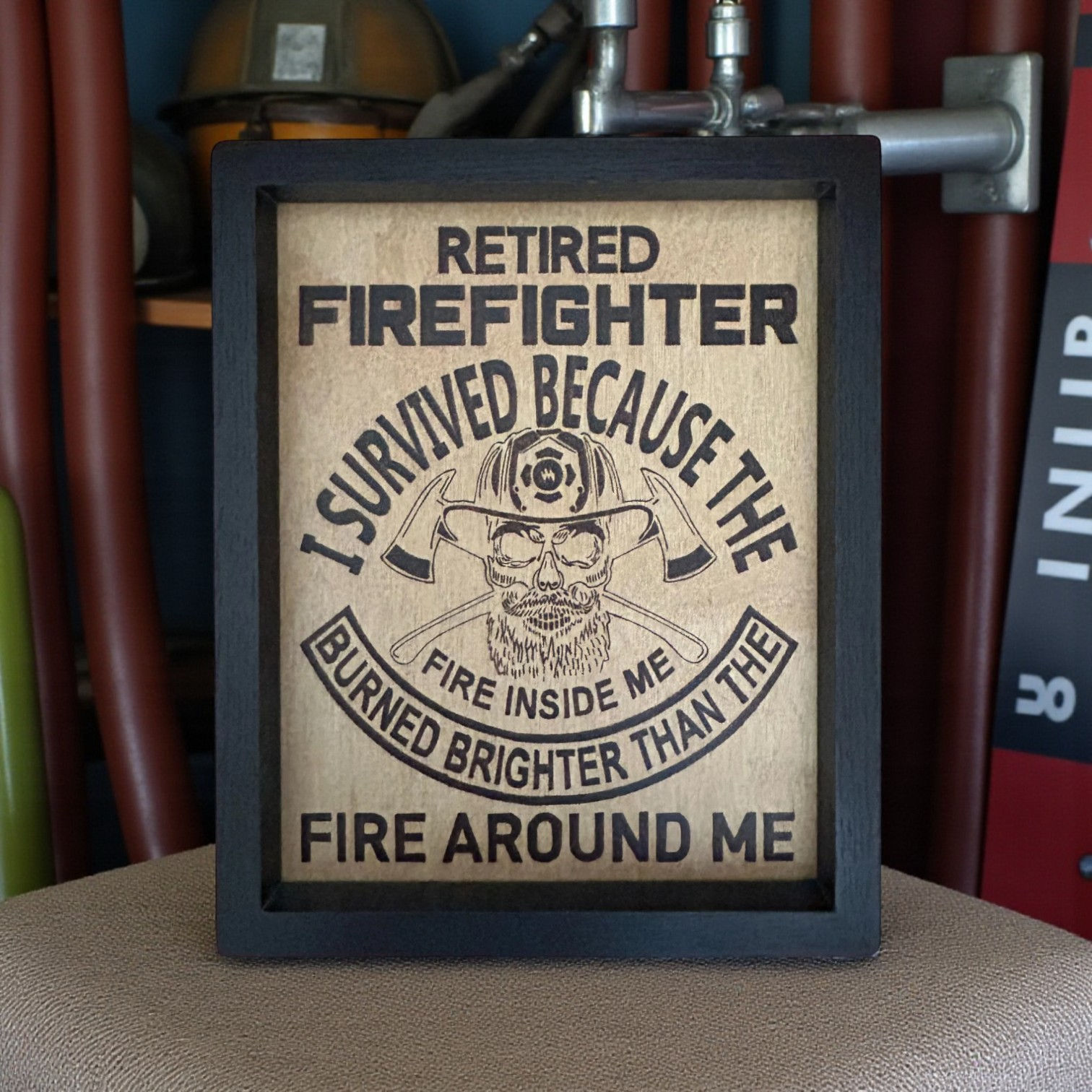 Handmade retired firefighter wood-burned sign with “fire inside me” quote