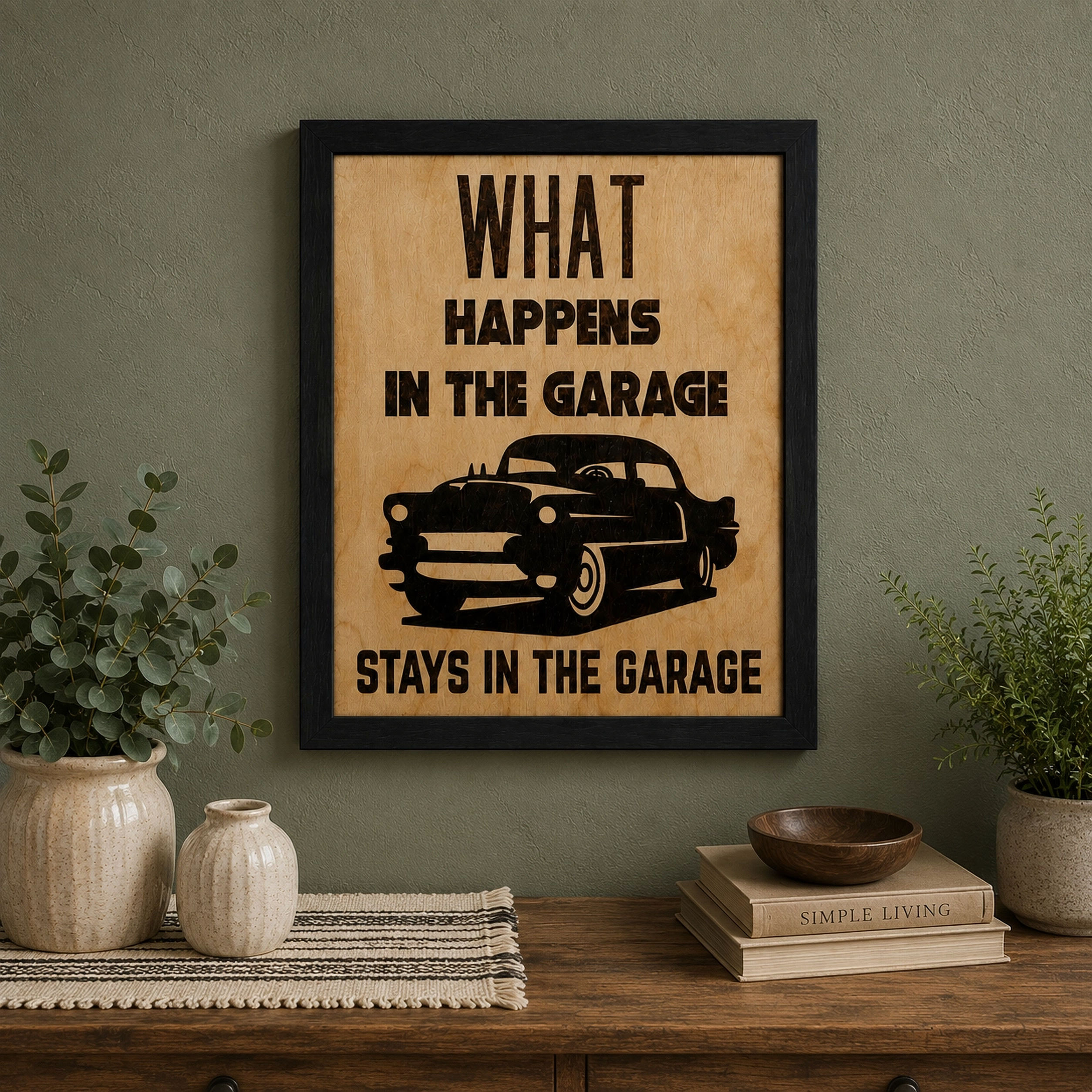 Hand-burned garage sign with classic car and funny garage saying in black frame.