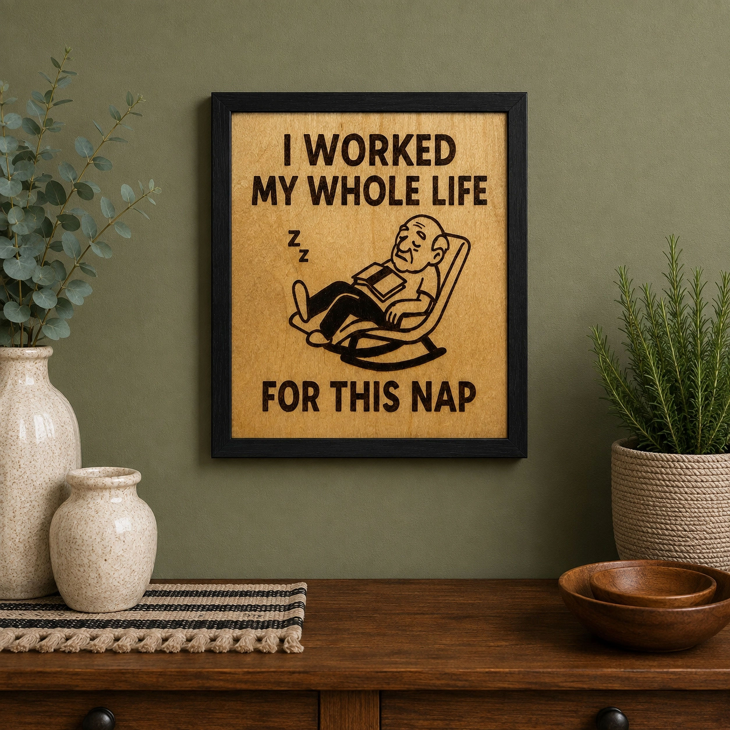 Hand-burned retirement sign with sleeping man in rocking chair.