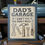 Thumbnail: Rustic mechanic gift idea sign hanging in a garage, with dad and son working together surrounded by tools and toy cars.