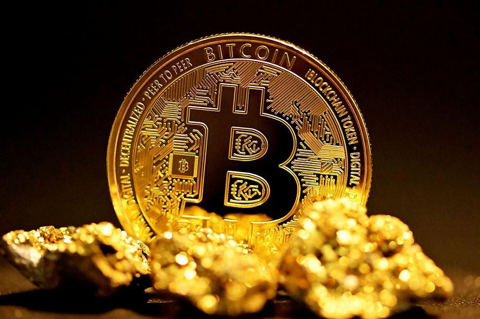 Physical Bitcoin with gold clumps in the foreground.