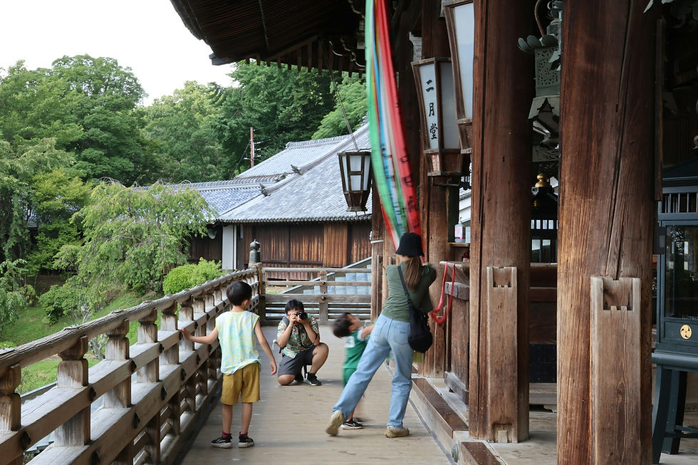 Japanese young family enjoying a day out at a temple.