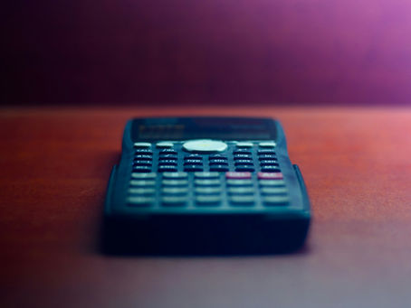 Stylish calculator on a desk.
