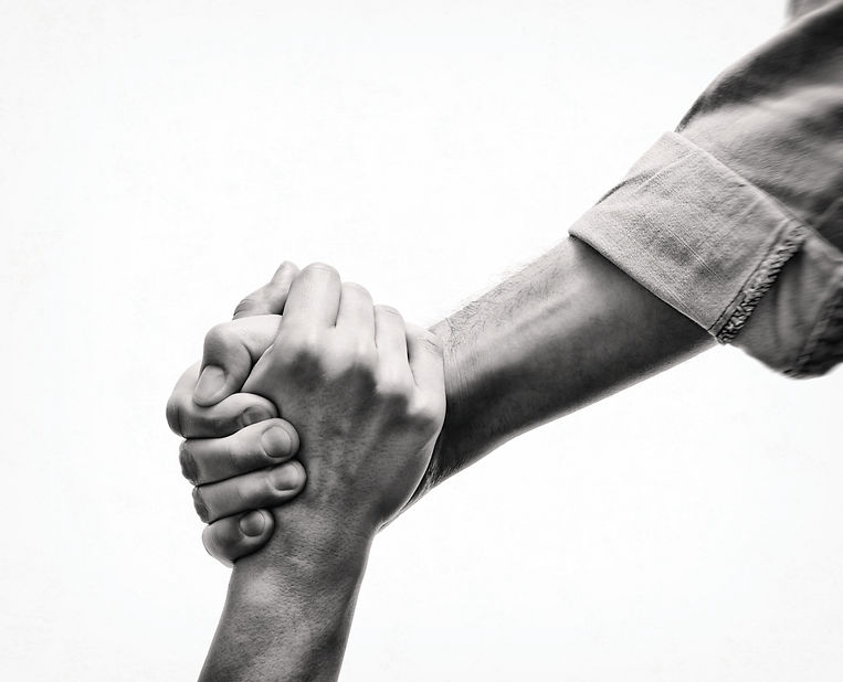 A human's hand saving the another human. Black and white image. Concept of salvation, dono