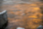 Sunset illuminates the merced river in a long exposure