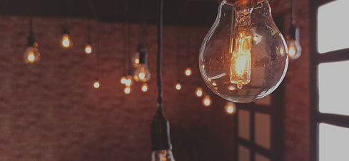 clear light bulb turned on during night time_edited.jpg