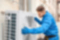 Male technician installing outdoor unit of air conditioner.jpg