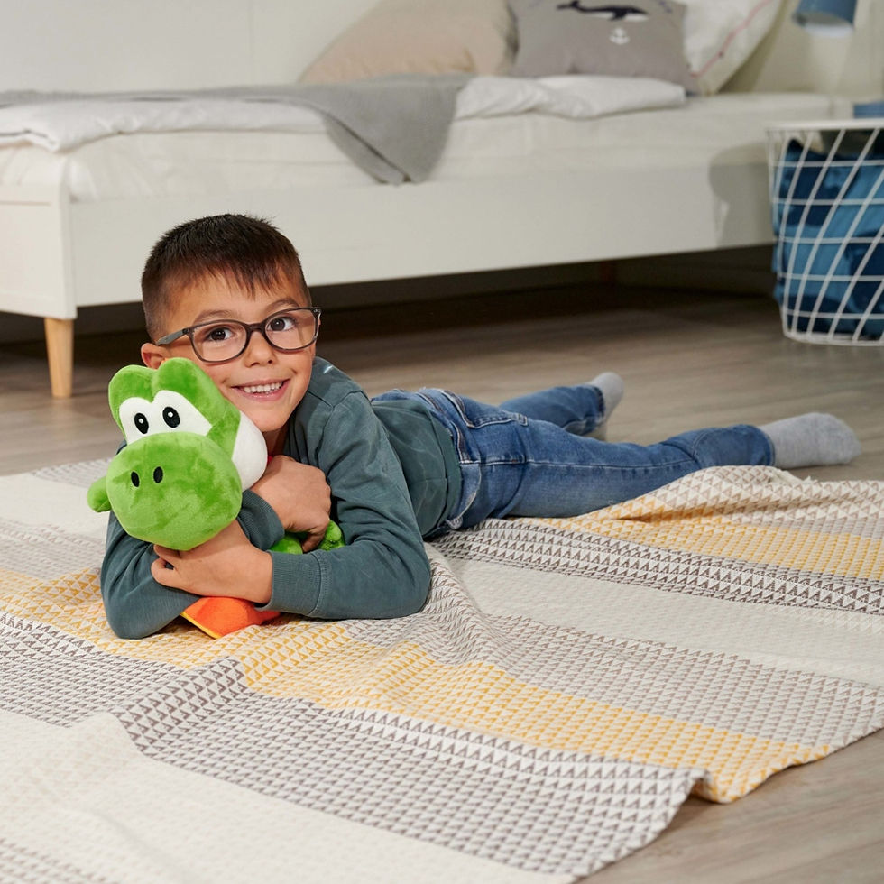 Thumbnail: Boy holding Yoshi toy
