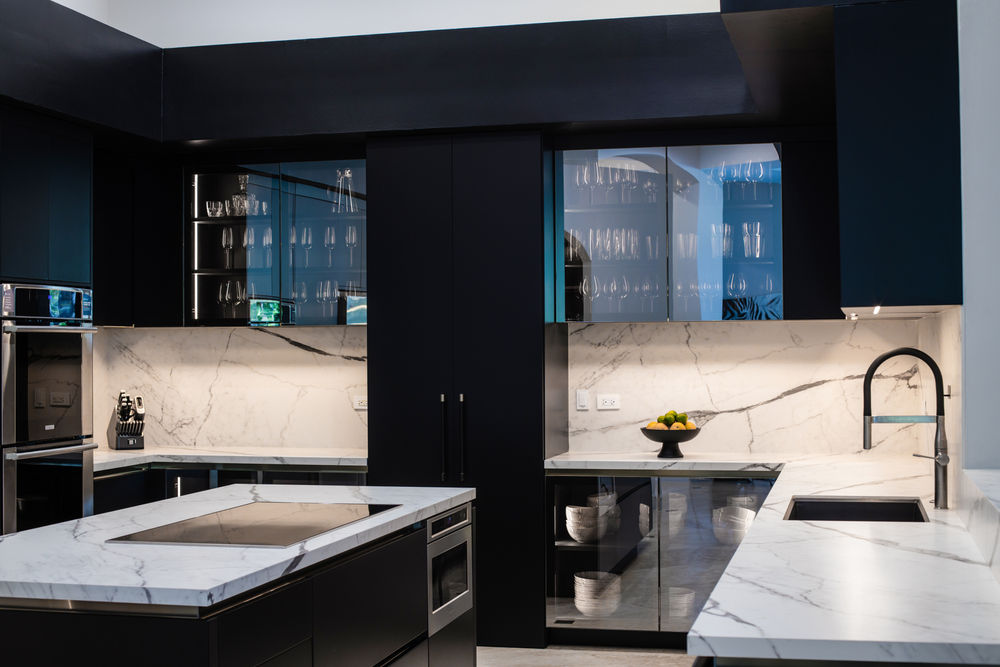 Modern kitchen design with marble countertops