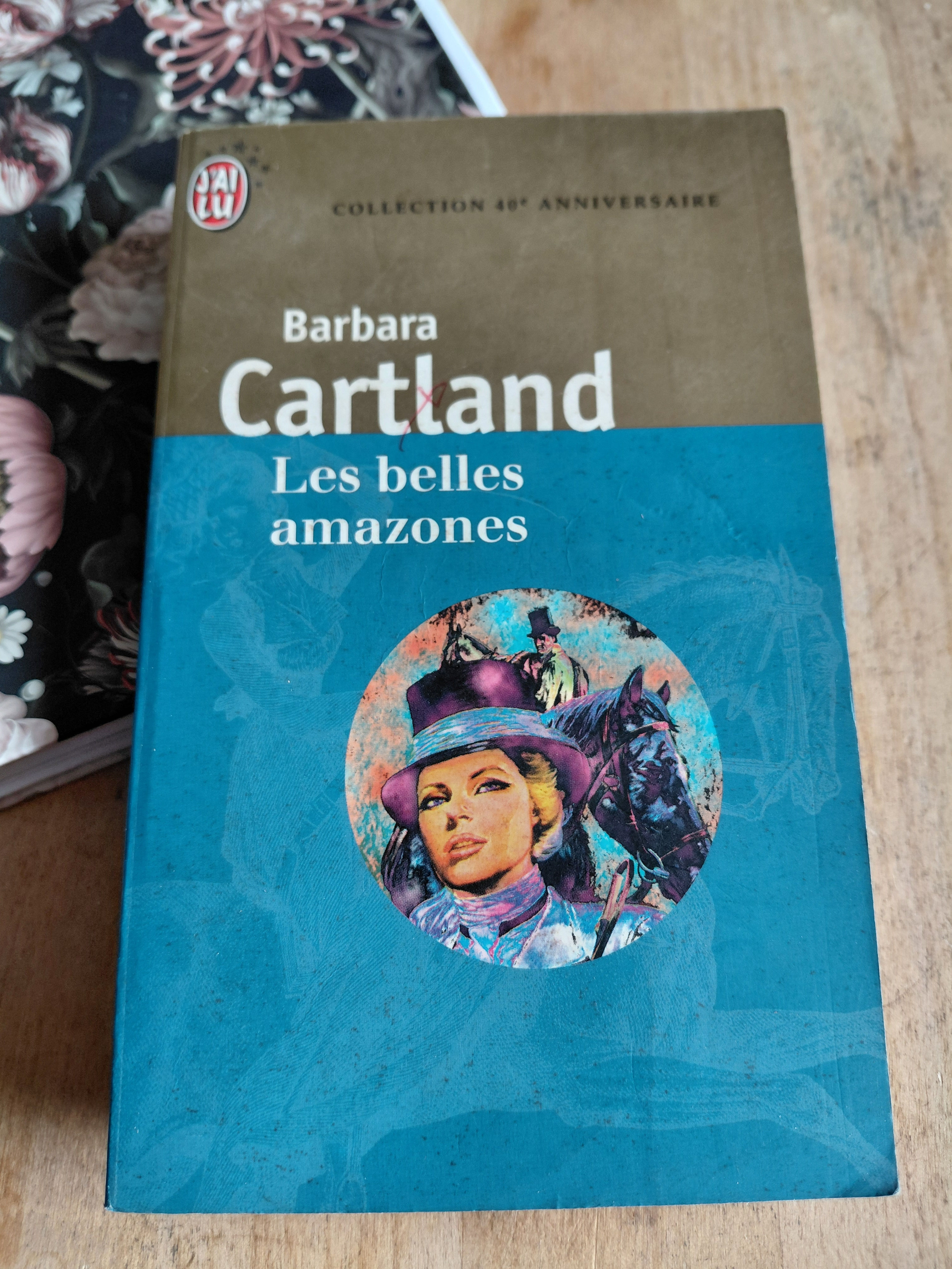 Couverture du livre de poche Les belles amazones par Barbara Cartland, Collection 40e Anniversaire aux éditions J'ai Lu, avec
