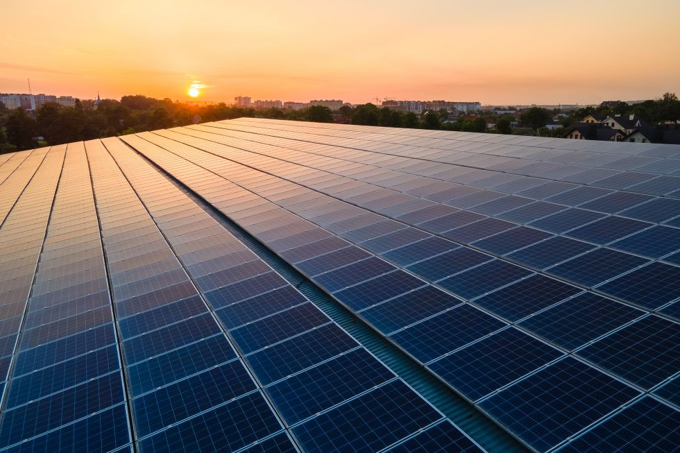 blue-photovoltaic-solar-panels-mounted-on-building-2023-11-27-05-13-53-utc-980x653.jpg