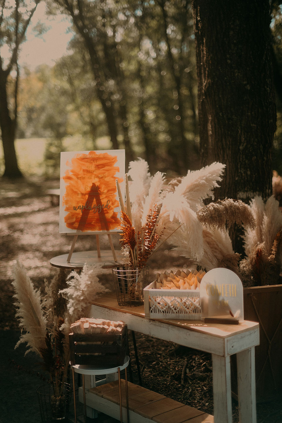 Entry table to a ceremony site decorated for a wedding
