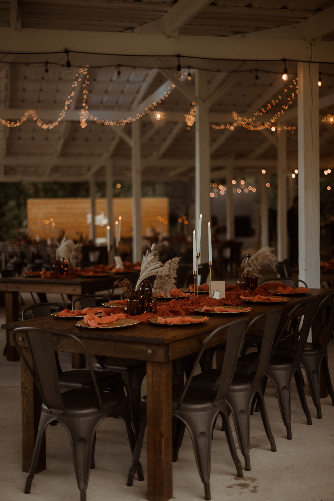 Wedding reception area decorated in rust colored decor