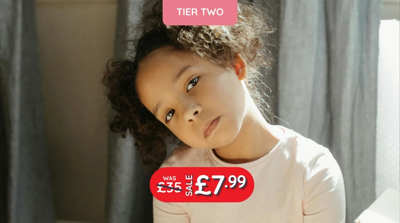 a little girl with curly hair is looking at the camera with the words tier two above her